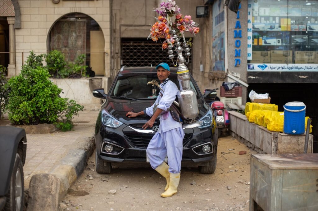 Man Selling Licorice Drink in Mohandessin District – Cairo
