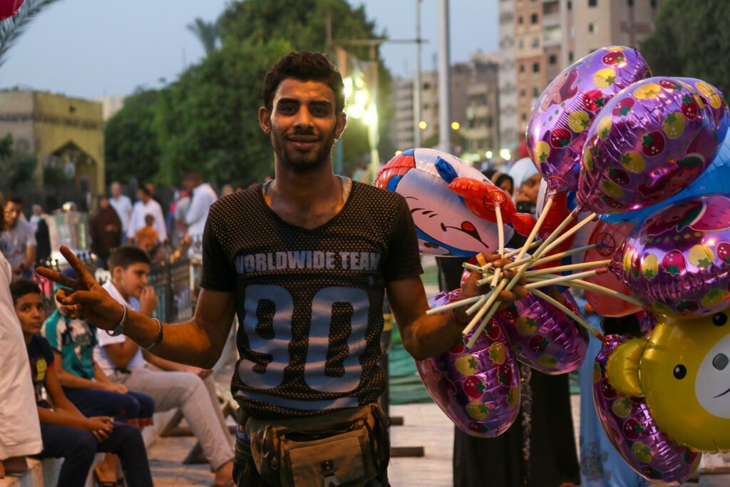 Street Vendor Selling Colorful Balloons for Children